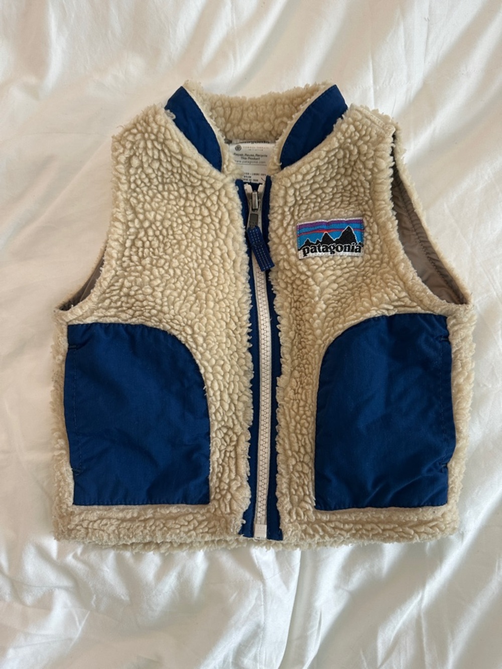 Patagonia Kids Cream Sherpa Vest with Blue Pocket Accents